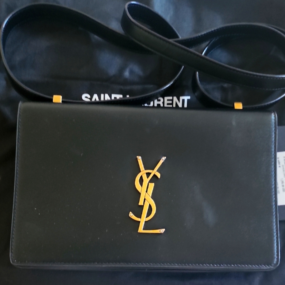 Saint Laurent Black Bag with Gold Logo